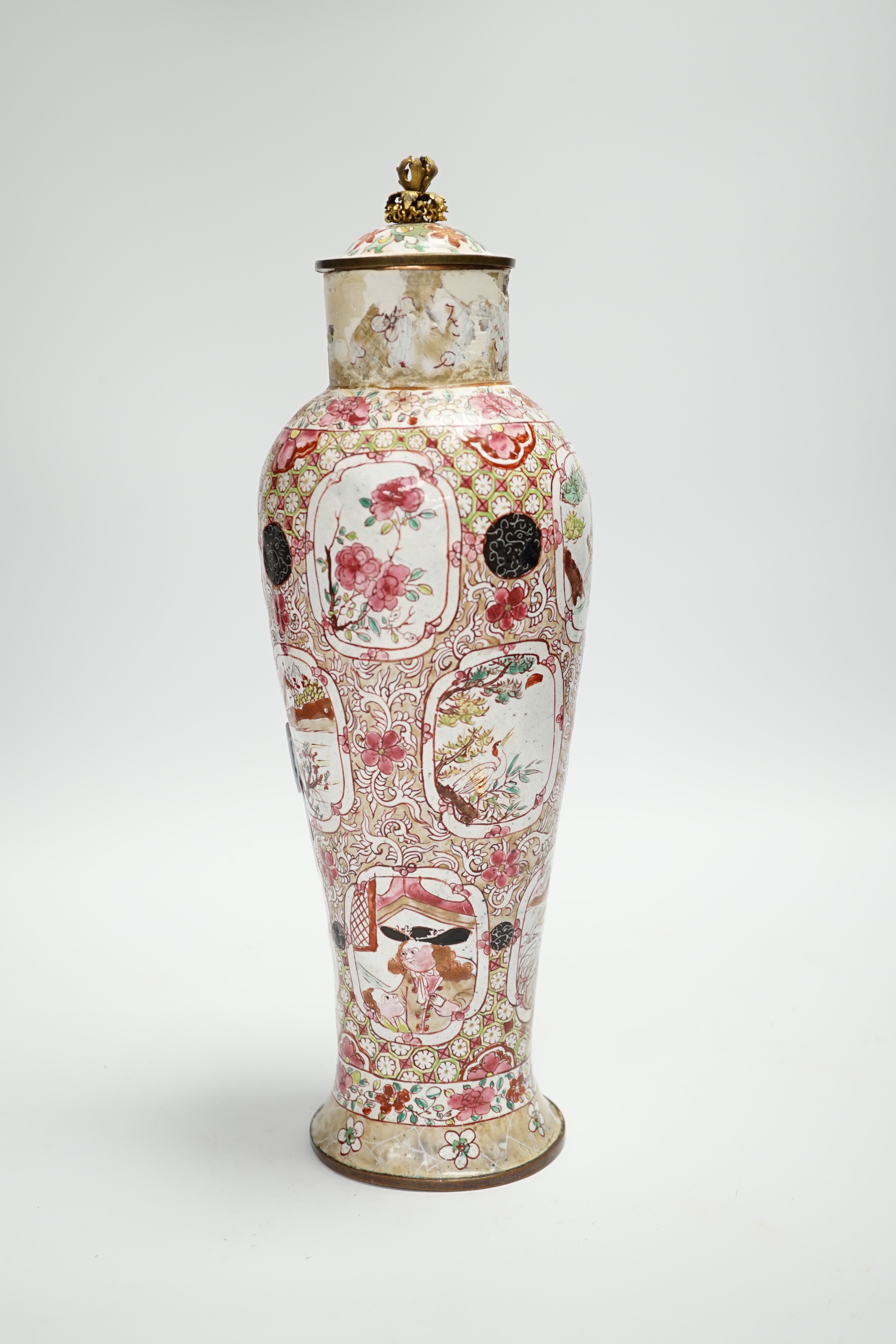 An 18th century Canton enamel European subject vase and associated cover, 30cm high